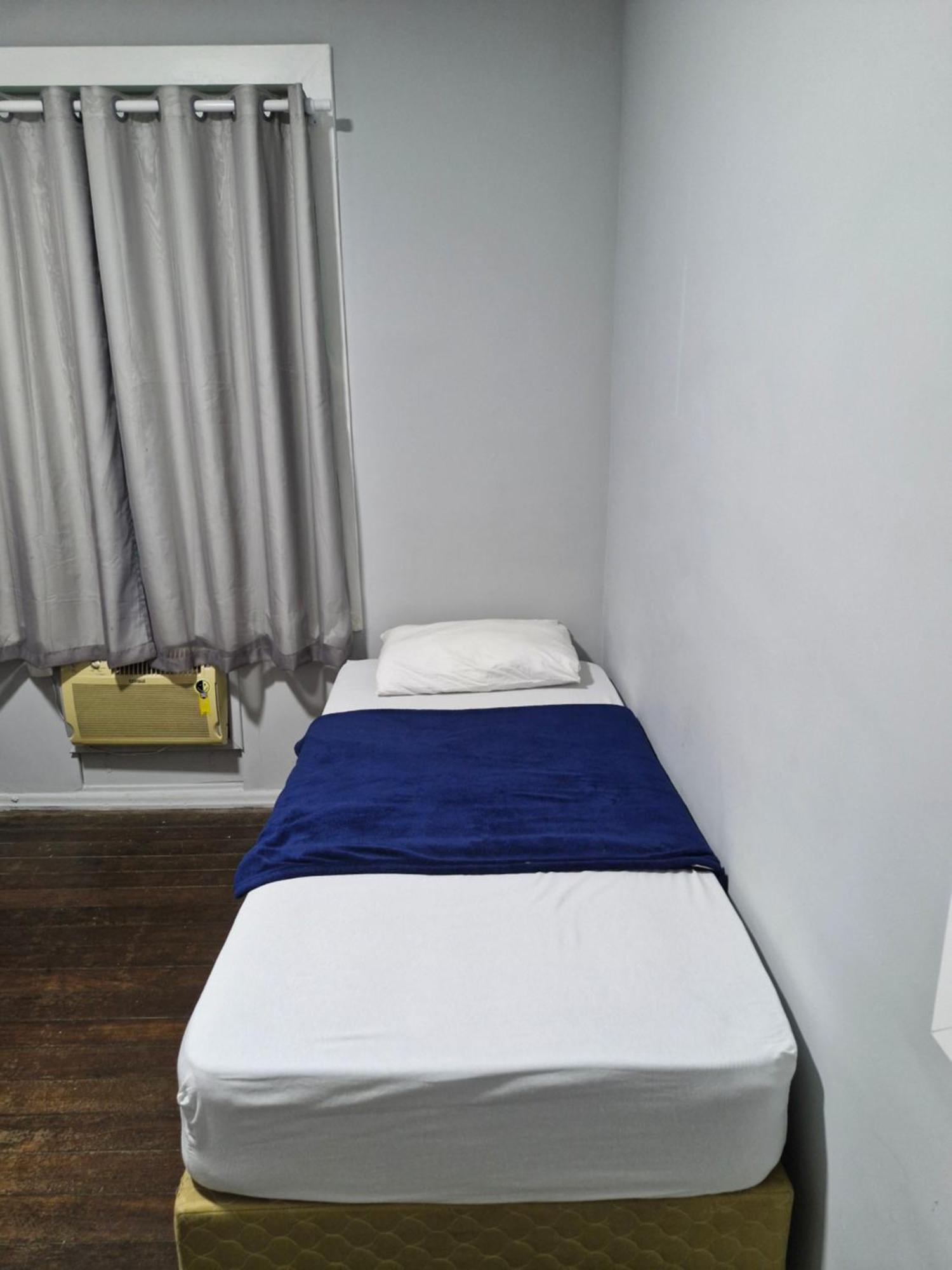 Cama Individual en habitación compartida femenina